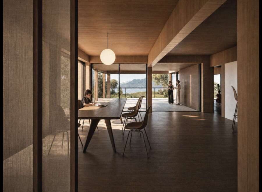 Experience modern living in this stunning home featuring a spacious open-plan dining and living area with floor-to-ceiling windows offering breathtaking views.