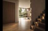 Experience modern living in this stunning home featuring expansive floor-to-ceiling windows that flood the space with natural light.