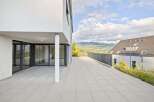 Experience modern living with this stunning property featuring a spacious terrace and breathtaking mountain views.
