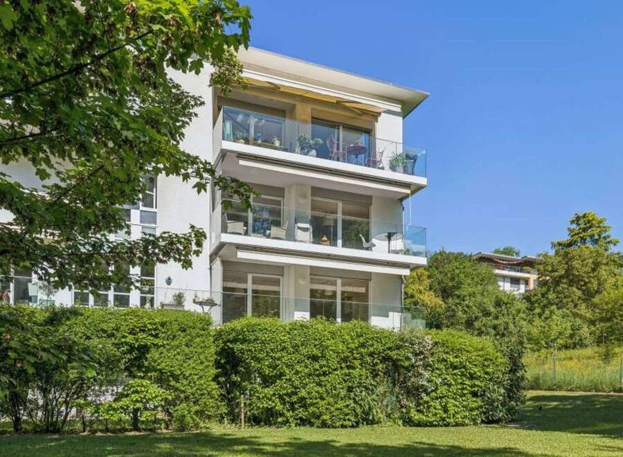 Discover modern living in this stunning three-story building with expansive balconies.