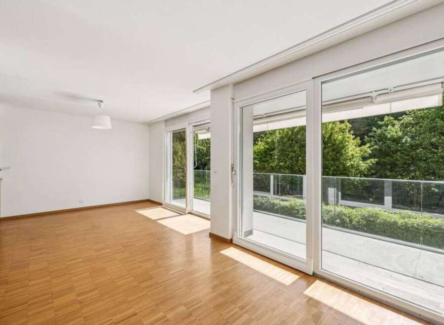 Experience the epitome of modern living in this stunning property, boasting expansive windows that flood the space with natural light.