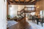 Step into this stunning home featuring a unique layout with a loft and a beautiful staircase.