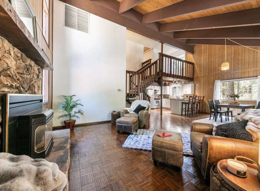 Step into this stunning home featuring a cozy fireplace, perfect for chilly evenings.