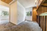 Step into this inviting space, featuring a neutral color palette and plush carpeting.