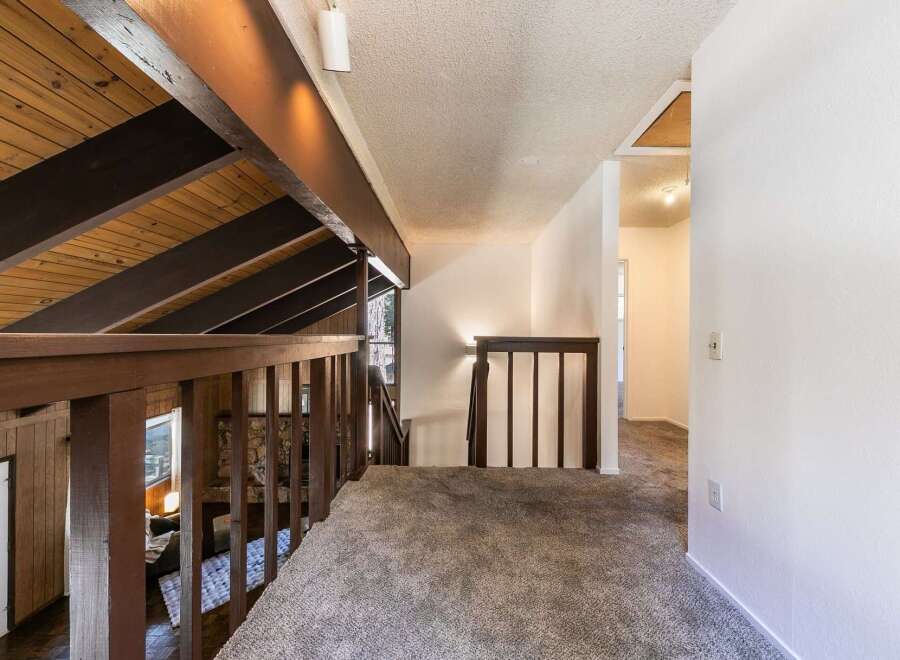 Step into this inviting home featuring a unique architectural design.