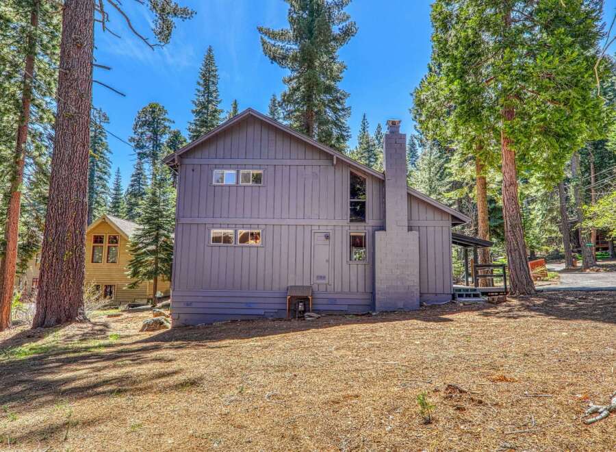 Nestled in a serene wooded setting, this property offers a tranquil escape.