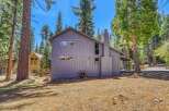 Nestled in a serene wooded setting, this property offers a tranquil escape.