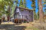 Nestled in a serene, wooded setting, this charming two-story home offers a perfect blend of comfort and nature.