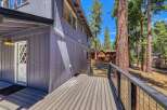 Enjoy the tranquility of this stunning property, featuring a spacious deck perfect for outdoor relaxation.