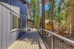 Enjoy the tranquility of this stunning property with a spacious deck, perfect for relaxing and taking in the surrounding natural beauty.