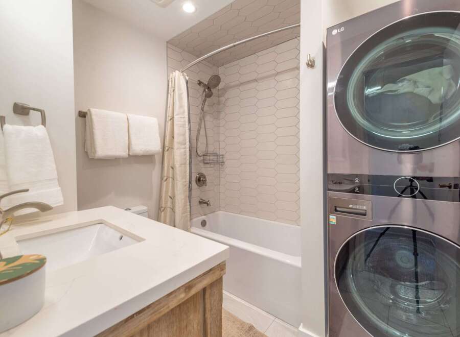 Step into a beautifully designed bathroom featuring modern amenities and stylish finishes.