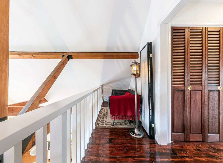 Discover the charm of this stunning property, featuring a cozy loft area perfect for relaxation.