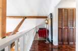 Discover the charm of this stunning property, featuring a cozy loft area perfect for relaxation.