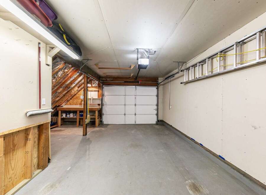 This spacious garage offers ample storage and functionality.