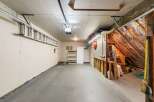 Step into this spacious garage, perfect for storage or a workshop.
