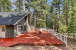 Escape to your dream retreat! This stunning property boasts a spacious deck, perfect for entertaining or relaxing amidst nature's beauty.