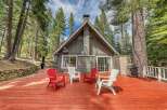 Escape to your dream cabin nestled in the serene embrace of nature.