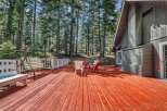 Enjoy the tranquility of nature from this stunning property featuring a spacious deck perfect for entertaining or relaxing.