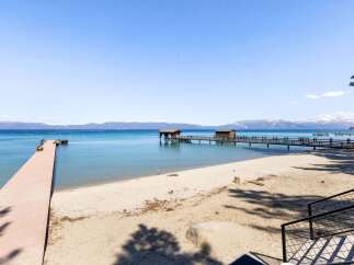 Experience waterfront living at its finest with this stunning property.