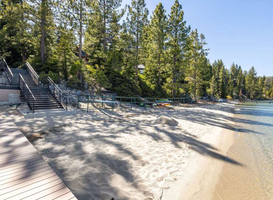 Discover your dream waterfront retreat! This stunning property boasts direct beach access, perfect for enjoying sun-soaked days and water activities.