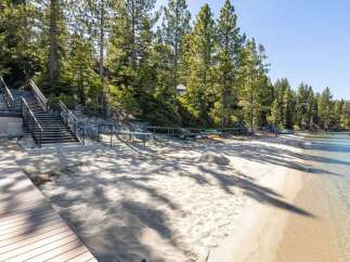 Discover your dream waterfront retreat! This stunning property boasts direct beach access, perfect for enjoying sun-soaked days and water activities.