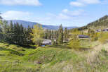 Discover your dream home nestled in a picturesque landscape.