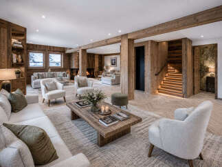 Step into luxury with this stunning property, showcasing exquisite wooden accents and a cozy fireplace.