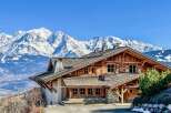 This stunning chalet offers breathtaking mountain views and luxurious living.