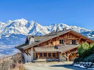 This stunning chalet offers breathtaking mountain views and luxurious living.