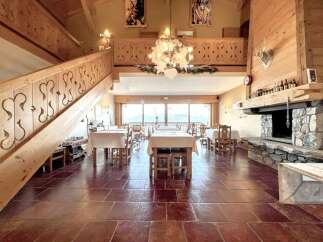 Step into a charming restaurant with a rustic ambiance, perfect for a cozy dining experience.