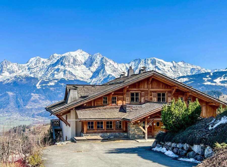 Experience the epitome of alpine luxury in this stunning chalet, nestled against the backdrop of majestic snow-capped mountains.