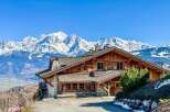 Experience the epitome of alpine luxury in this stunning chalet, nestled against the backdrop of majestic snow-capped mountains.