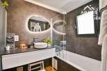 Discover modern luxury in this stunning bathroom! Featuring sleek design elements, this space offers a spa-like experience.