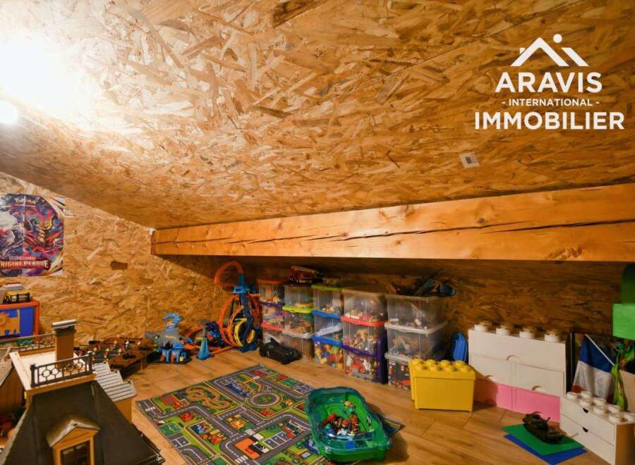 Discover a charming attic space perfect for a playroom or creative retreat.