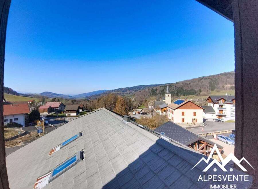 Enjoy breathtaking mountain views from this charming property.