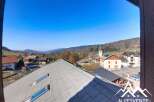Enjoy breathtaking mountain views from this charming property.