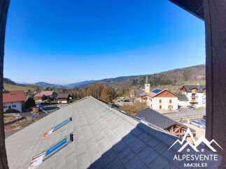 Enjoy breathtaking mountain views from this charming property.