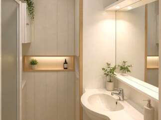 Discover a modern and minimalist bathroom featuring a sleek sink and vanity area with a large mirror.
