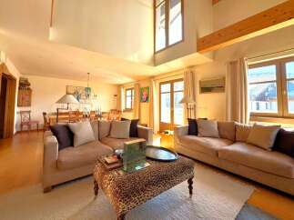 Step into luxury with this stunning living room, featuring a spacious layout and elegant design.