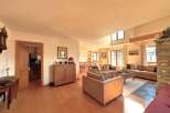 Step into this inviting living space, featuring a seamless blend of comfort and style.