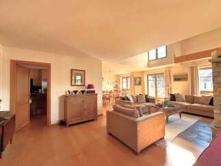 Step into this inviting living space, featuring a seamless blend of comfort and style.