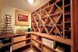 Discover the epitome of luxury living with this stunning property, featuring a dedicated wine cellar.