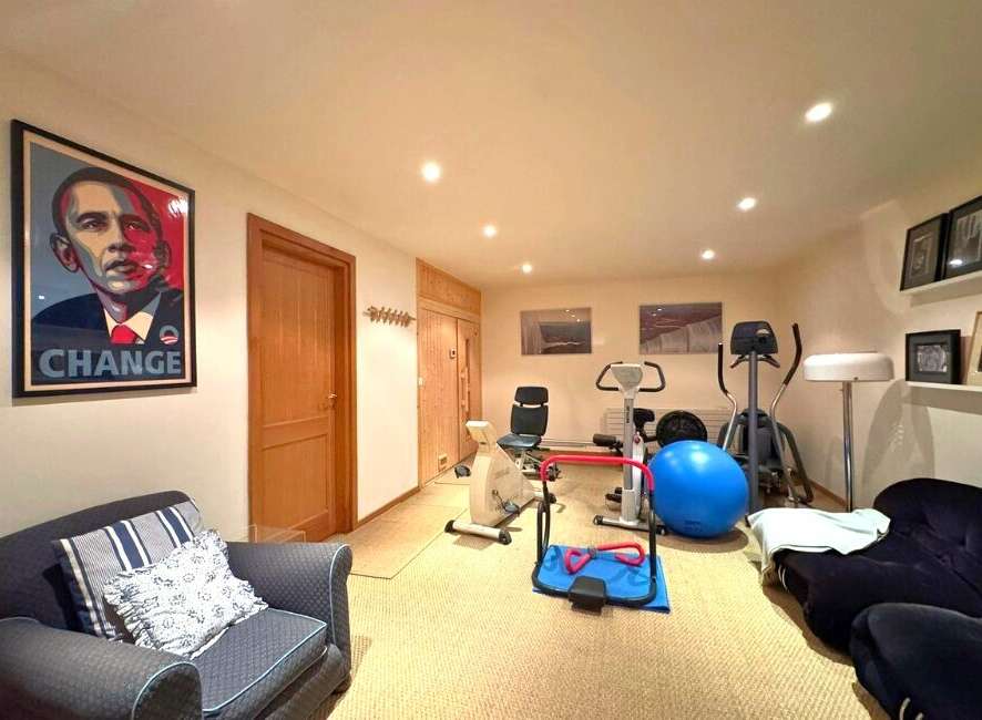 This property boasts a well-equipped home gym, perfect for maintaining a healthy lifestyle.