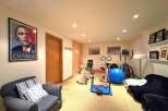 This property boasts a well-equipped home gym, perfect for maintaining a healthy lifestyle.