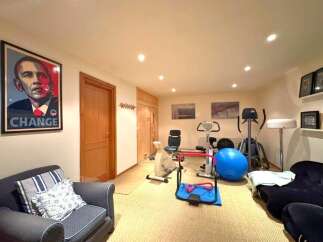 This property boasts a well-equipped home gym, perfect for maintaining a healthy lifestyle.