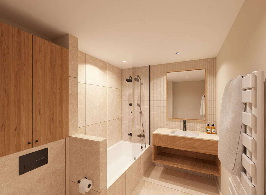 Experience modern luxury in this stunning bathroom featuring a sleek bathtub and shower combination, complemented by warm wood cabinetry and elegant stone tiling.