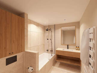 Experience modern luxury in this stunning bathroom featuring a sleek bathtub and shower combination, complemented by warm wood cabinetry and elegant stone tiling.