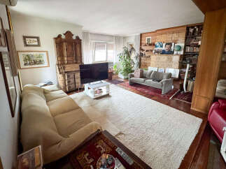 Step into this inviting living space, perfect for relaxation and entertaining.