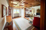 Step into luxury with this stunning property featuring a beautifully crafted wooden ceiling and elegant decor.