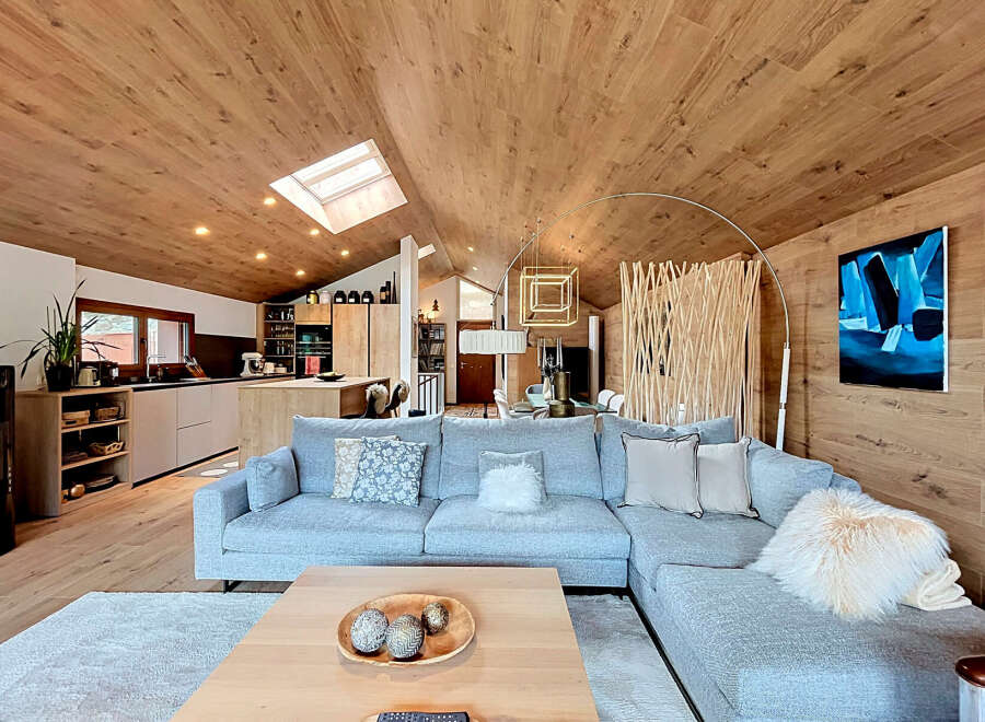 Experience luxury living in this stunning property, showcasing a modern interior with a focus on natural materials.